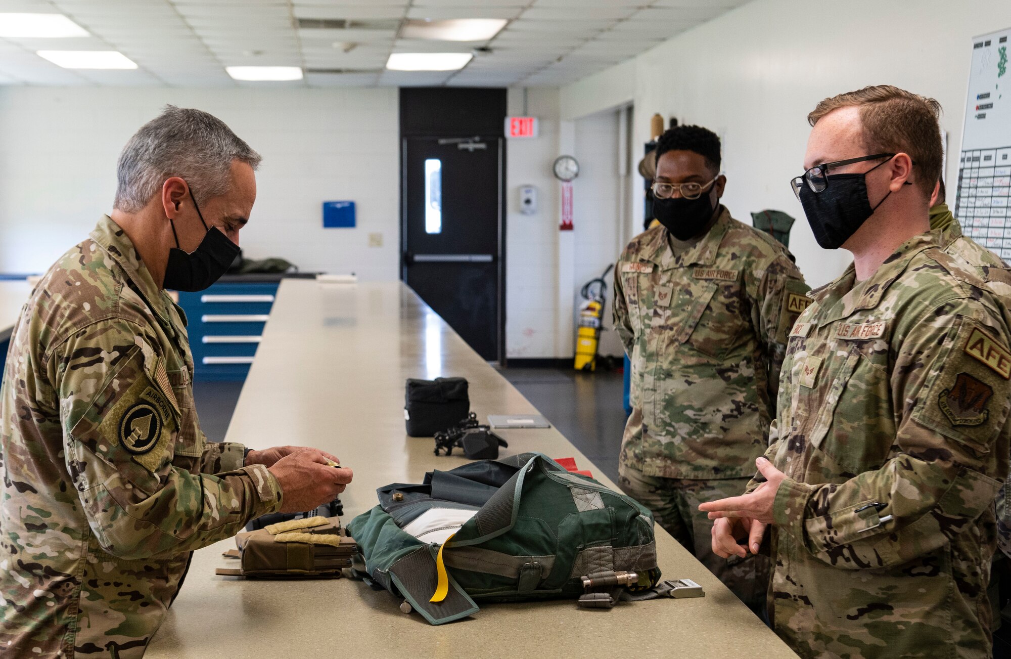 Photo of leadership talking to Airmen