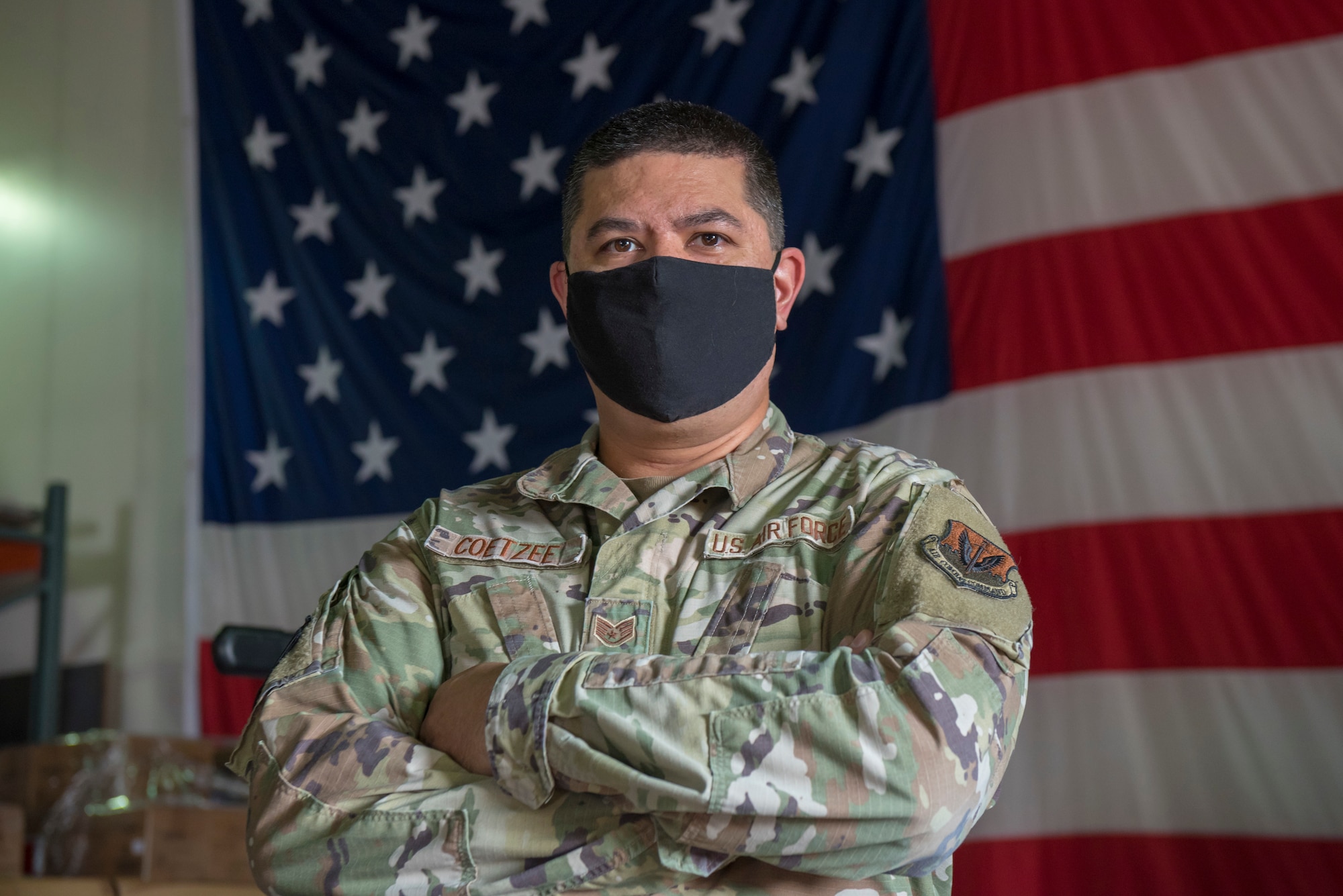Airman stands for portrait.
