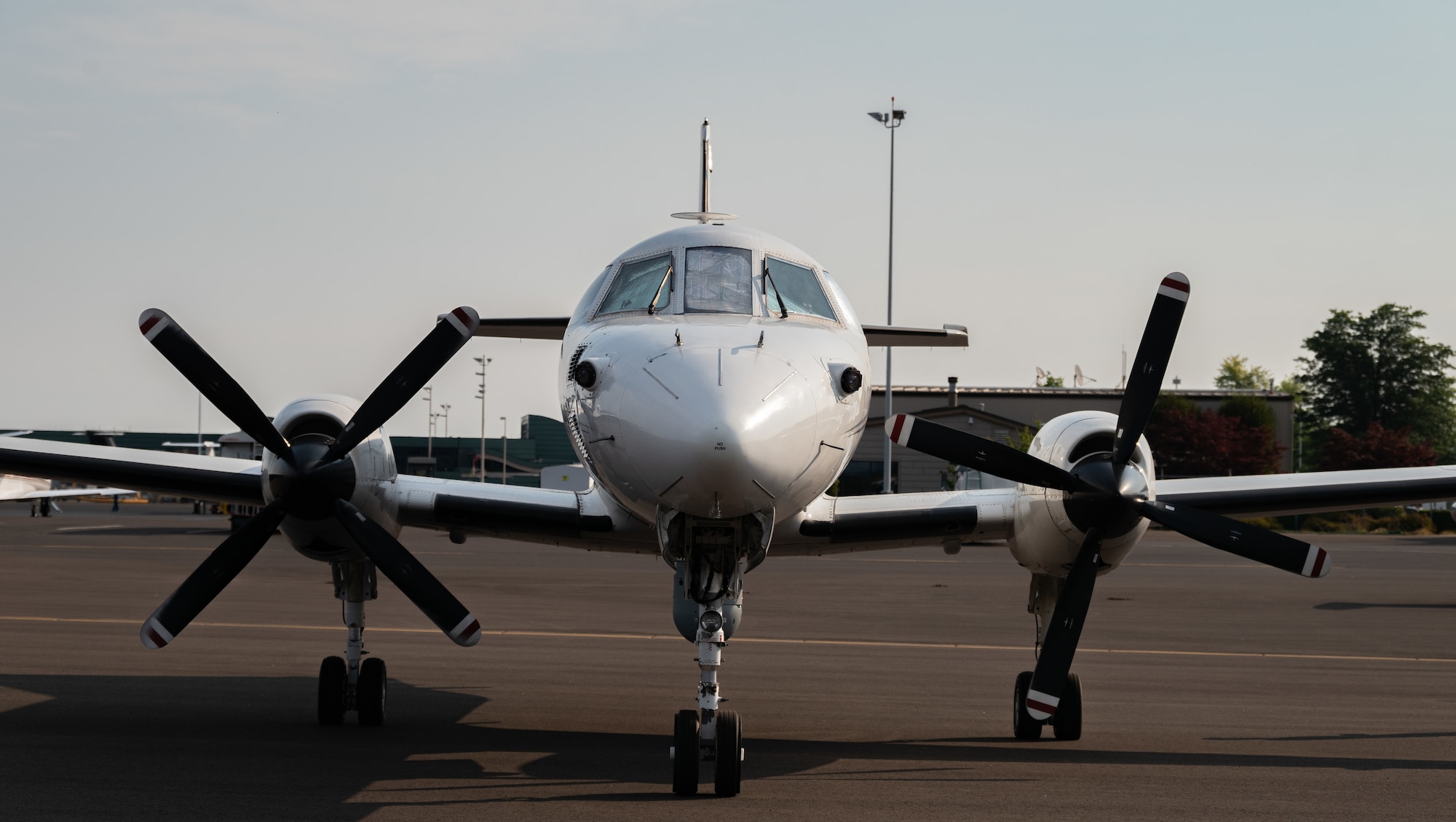 A U.S. Air Force RC-26B Metroliner aircraft assigned to the 162nd Fighter Wing, Arizona Air National Guard, sits on the flight line prior to departing on a wildland fire mapping and detection mission in support of the U.S. Forest Service at the Eugene Airport, Eugene, Ore., August 1, 2021.