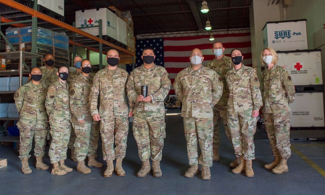 Airmen stand for a photo.
