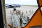 Image of Airmen loading a plane.