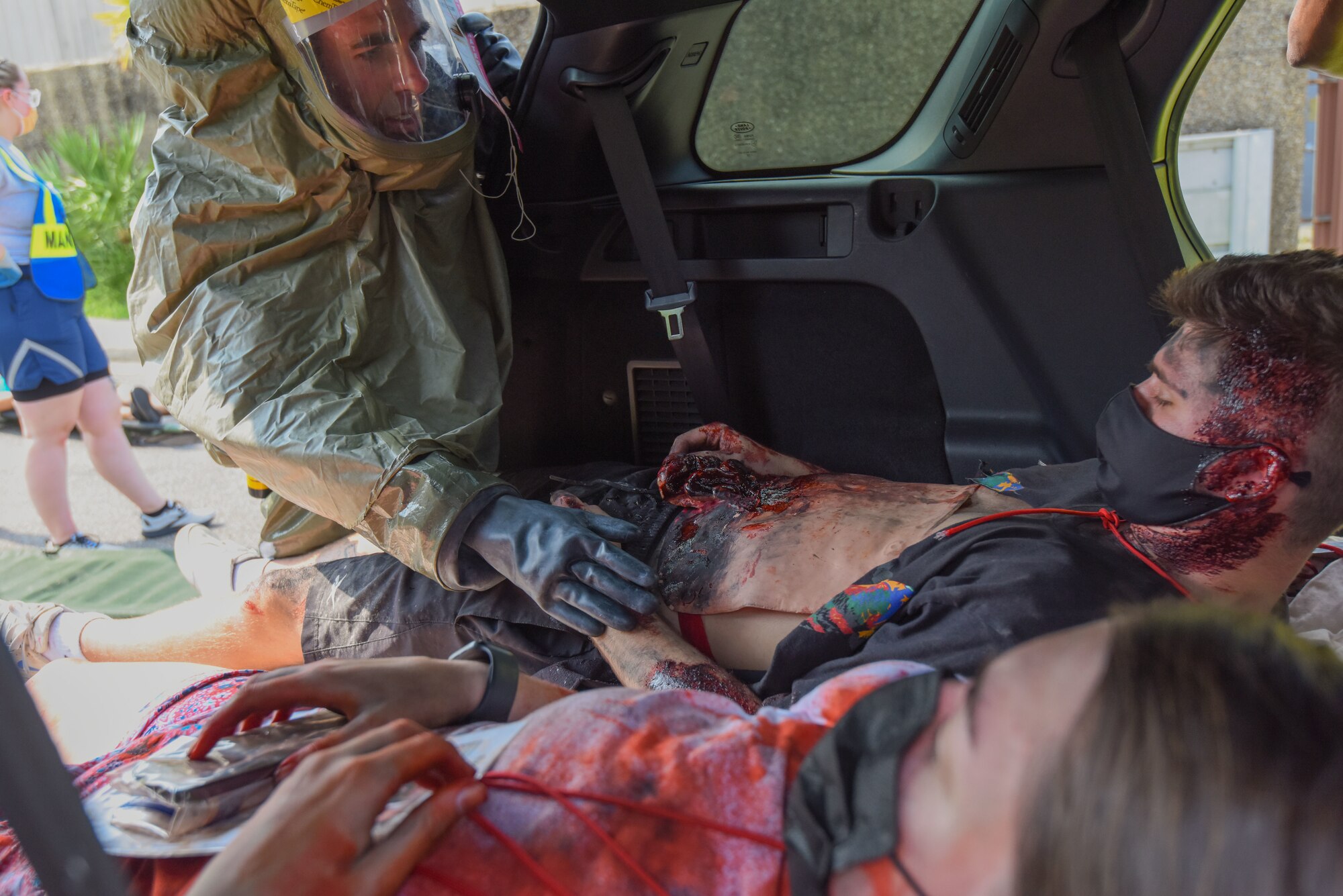 A Keesler first responder conducts medical assessments during the Ready Eagle Chemical, Biological, Radiological, Nuclear exercise at Keesler Air Force Base, Mississippi, Aug. 6, 2021. The exercise tested the base's ability to respond to and recover from a mass casualty event. (U.S. Air Force photo by Airman 1st Class Jasmine Galloway)