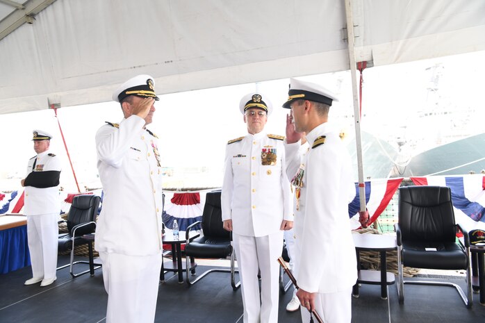 Capt. Kyle Gantt, left, assumes command as commodore, Commander, Task Force (CTF) 65 from Capt. Joseph Gagliano, right, while presided over by Vice Adm. Gene Black, commander, U.S. Sixth Fleet, center, during a change of command ceremony at Naval Station Rota, Aug.10, 2019. CTF 65 and DESRON 60, headquartered in Rota, Spain, overseas the forward-deployed forces of U.S. Sixth Fleet’s area of operation in support of regional allies and partners as well as U.S. national security interests in Europe and Africa.