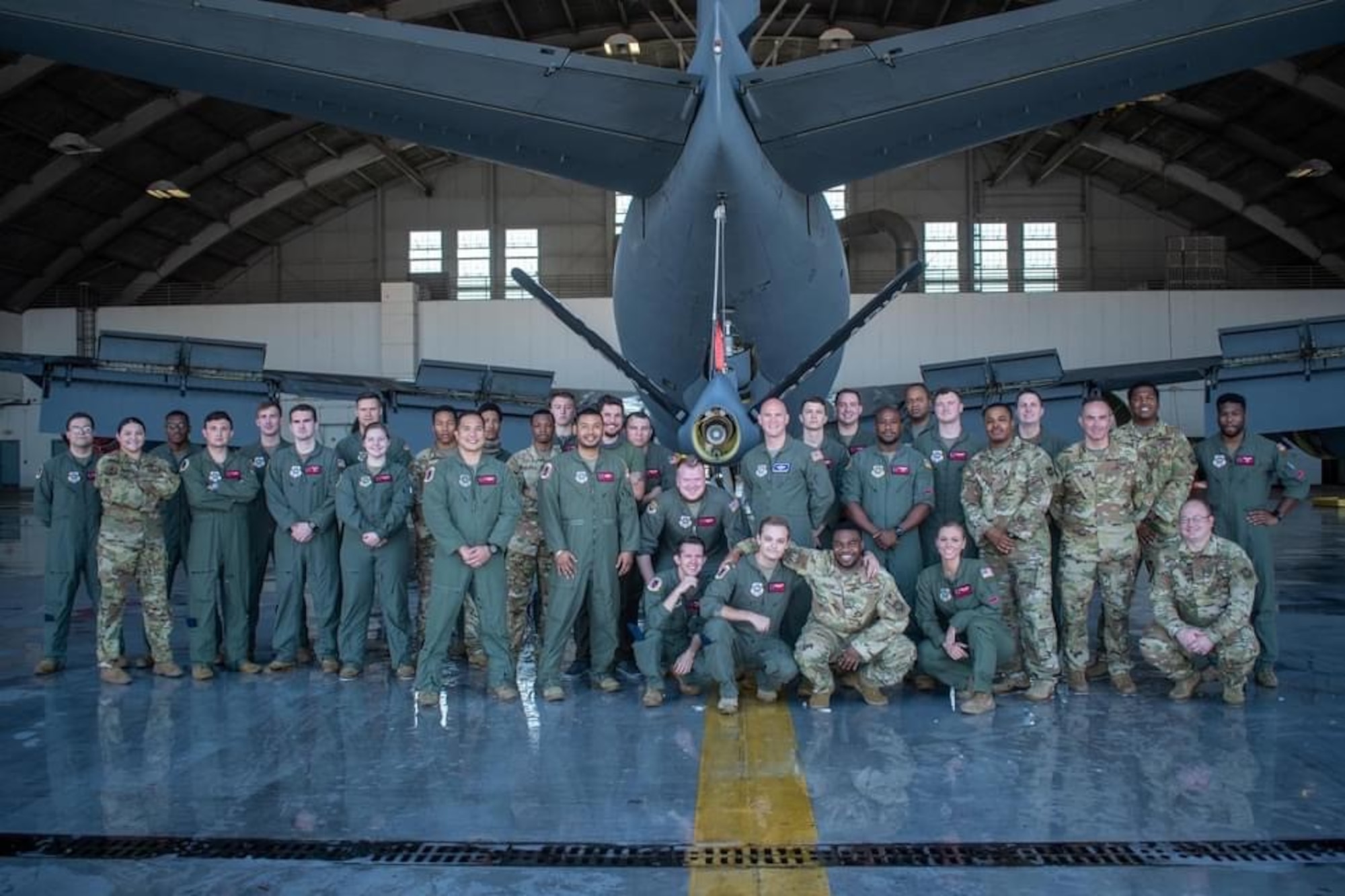 Airmen from the 50th Air Refueling Squadron (ARS) ‘Red Devils’ pose for a photograph under the boom of a KC-135 Stratotanker aircraft at MacDill Air Force Base, Florida. The 50th ARS recently won the 2020 Senior Master Sgt. Albert Evans Award, recognizing them as the best air refueling section in the Air Force. (Courtesy photograph)