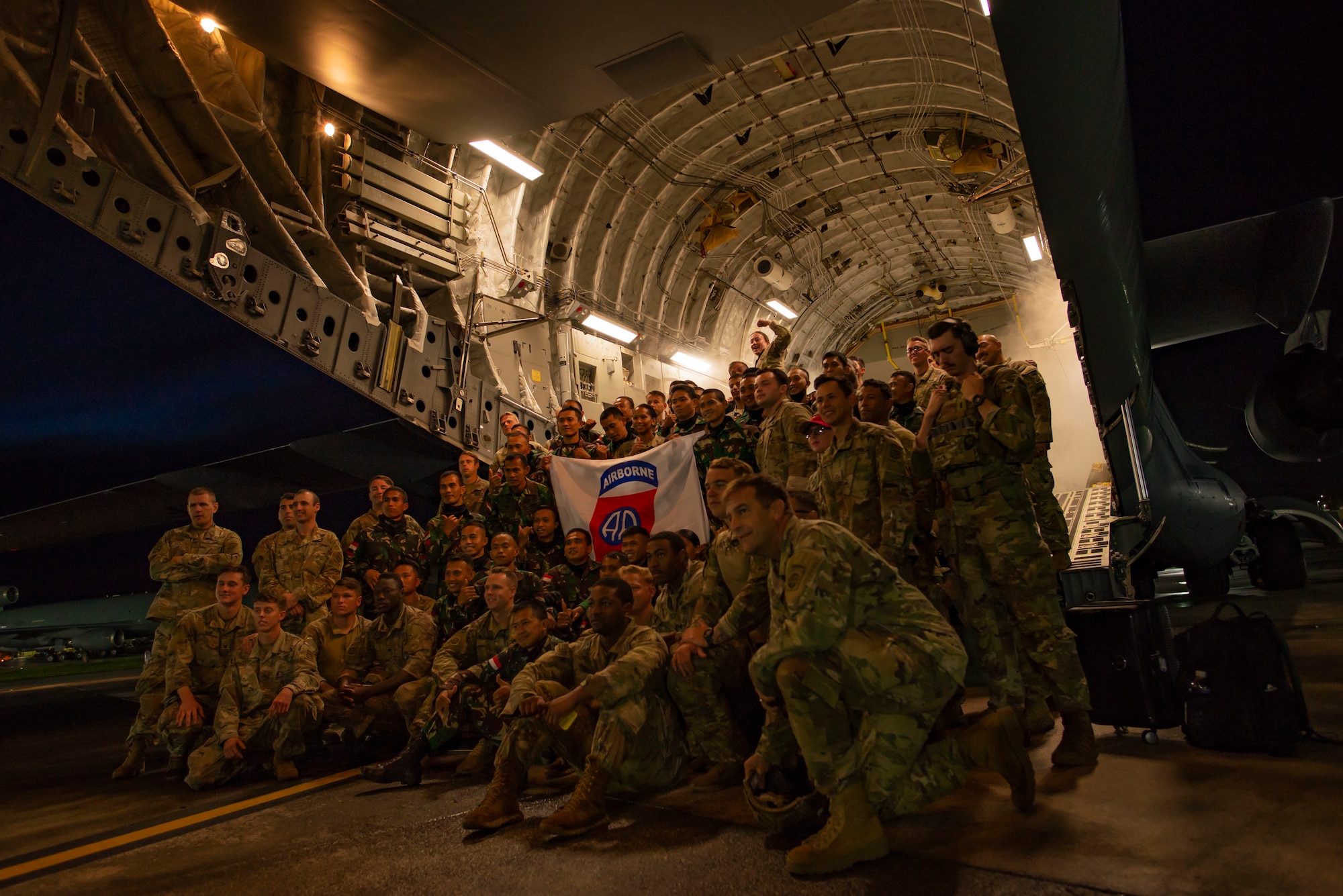 A group of paratroopers poses for a photo.