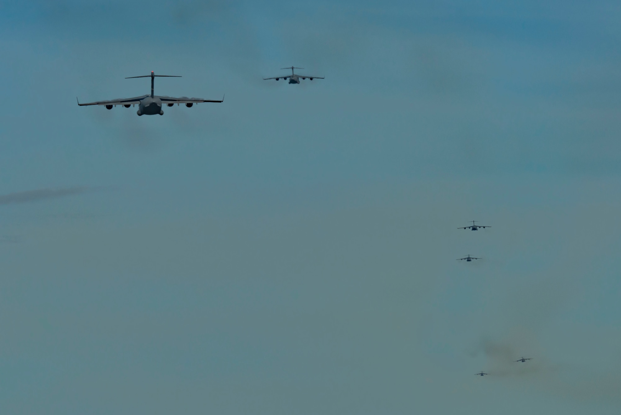Six planes take off from Andersen Air Force Base, Guam.