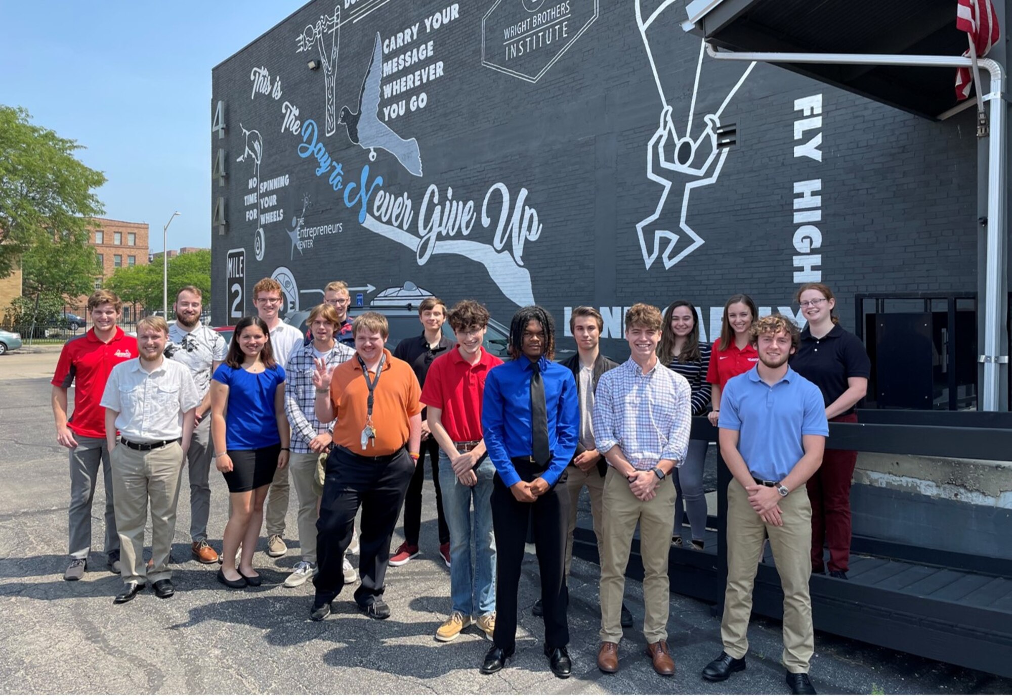 A cohort of interns smiles for a group photo in front of the Wright Brother Institute's downtown location, Aug. 10, 2021, in Dayton, Ohio. These students are participants in the "Summer of Innovation - Digital Drone" program. (Courtesy photo)