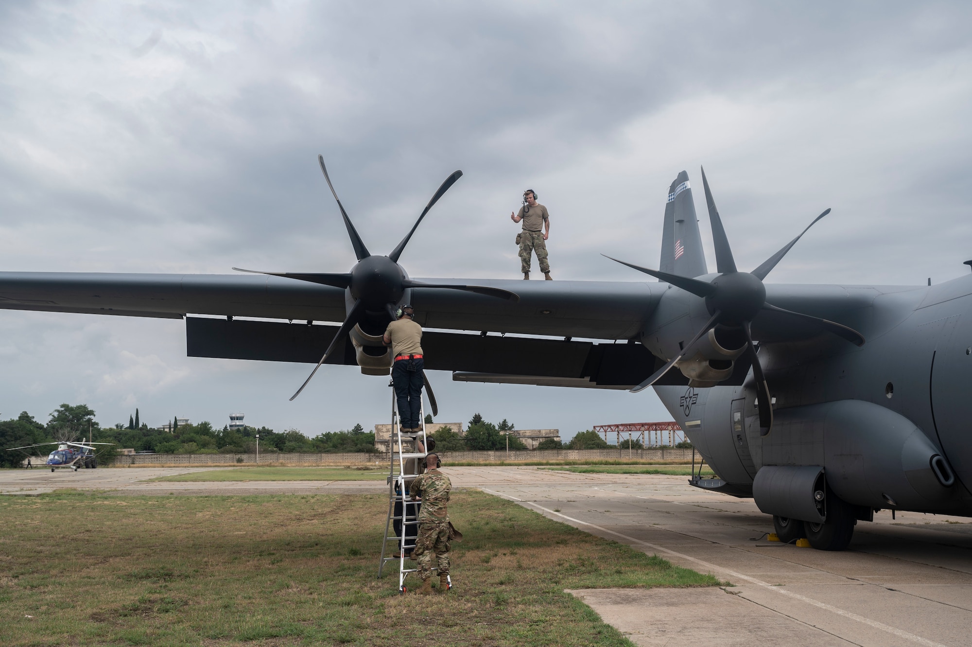 U.S. Air Force Airmen assigned to the 86th Aircraft Maintenance Squadron inspect a C-130J Super Hercules aircraft after a flight through Georgian airspace during exercise Agile Spirit 21