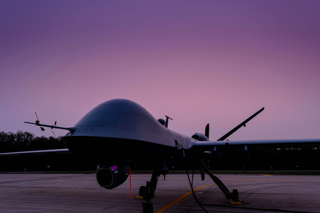 An unmanned aerial vehicle sits on a flightline.