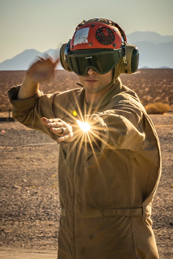 A U.S. Marine with Marine Light Attack Helicopter Squadron (HMLA) 773 prepares a UH-1Y Venom for takeoff during Integrated Training Exercise (ITX) 4-21 at Marine Corps Air Ground Combat Center, Twentynine Palms, California on Aug. 3, 2021.HMLA-773 is supporting Marine Air Ground Task Force 25 as part of the Aviation Combat Element during ITX, providing close air support and deep air support to the Ground Combat Element. (U.S. Marine Corps photo by Lance Cpl. Samwel Tabancay)