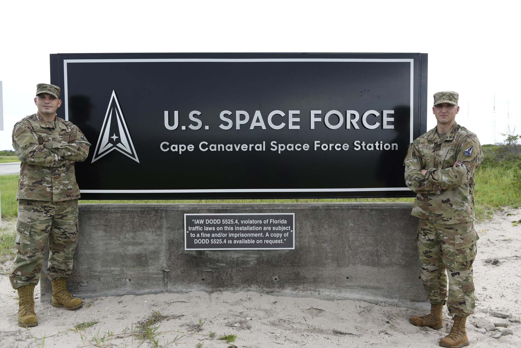 Master Sgt. Keith Carpenter, left, Space Launch Delta 45 Inspector General superintendent, and Tech. Sgt. Christopher French, 5th Space Launch Squadron mission assurance instructor, stand in front of a Space Force sign Aug. 9, 2021, at Cape Canaveral Space Force Station, Florida. Carpenter and French were selected as 2020 Space Operations Command Space Launch Maintainer of the Year award recipients. (U.S. Space Force photo by Airman 1st Class Samuel Becker)
