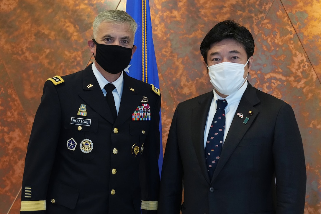 U.S. Army Gen. Paul M. Nakasone, U.S. Cyber Command commander and National Security Agency director, poses with the Honorable Yasuhide Nakayama, Japan Ministry of Defense, State Minister of Defense, at Fort George G. Meade, Md., Aug. 9, 2021.