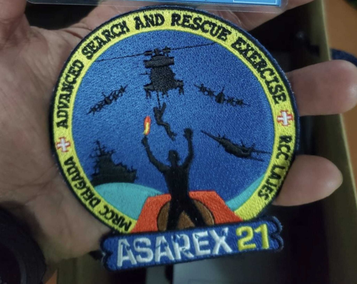 An Airman displays the patch awarded to those participating in ASAREX 2021, a NATO search and rescue exercise hosted by the Portuguese Air Force in the Azores at the end of July 2021. The New York Air National Guard’s 106th Rescue Wing  participated in the training.