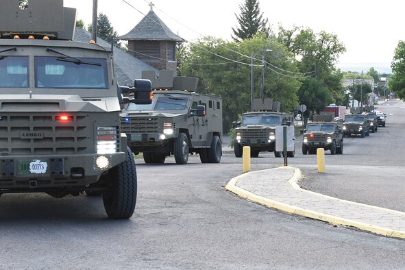 A Bearcat convoy proceeds in formation during a Logistics Integrated Response Plan exercise at Cascade School Aug. 9, 2021, in Cascade, Mont. The LIRP exercise is designed to better prepare defenders and Malmstrom leadership for real-world emergency situations through working with federal, local law enforcement and community representatives. (U.S. Air Force photo by Airman Elijah Van Zandt)