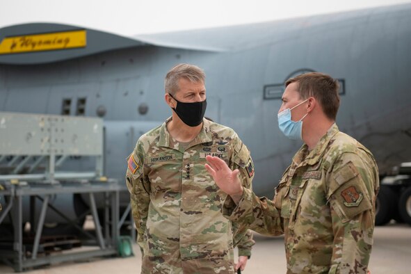 U.S. Air Force Technical Sgt. Timothy Williams explains the Modular Airborne Fire Fighting System (MAFFS) to Army Gen. Daniel Hokanson, chief, National Guard Bureau, at the Wyoming Air National Guard base, Cheyenne, Wyo., Aug. 7, 2021.