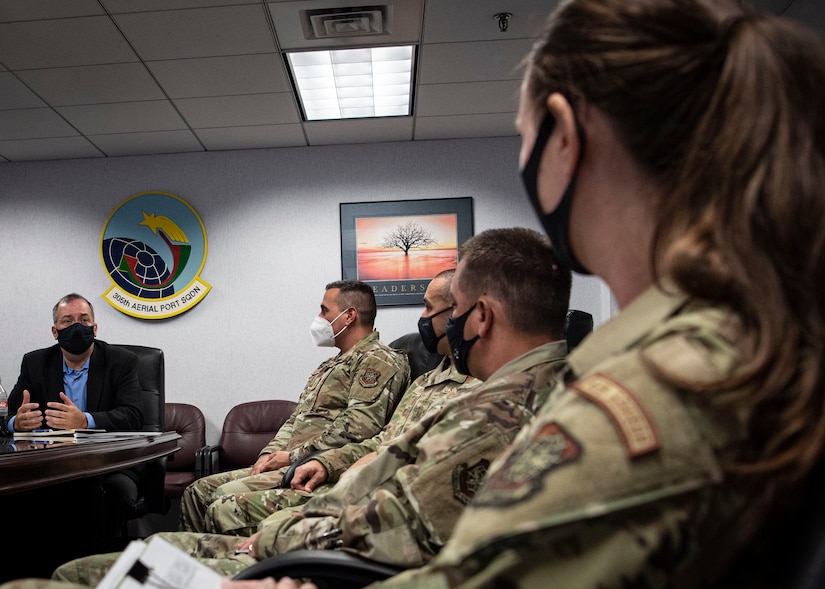 Photo of Dr. Albert Lowas, Air Mobility Command chief scientist, speaking with Airmen assigned to the 305th Maintenance Group.