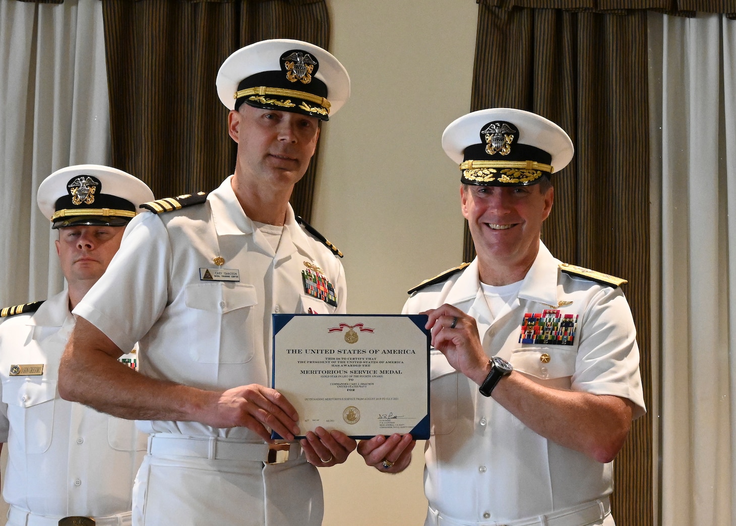 File:US Navy 040718-N-0535P-039 Sailors and Marines salute while a wreath  is committed