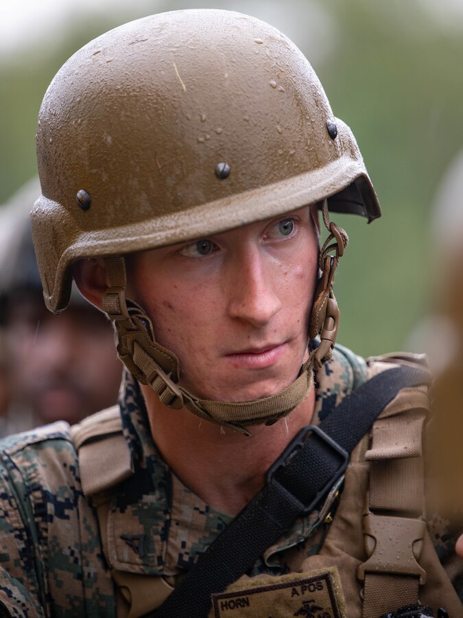 Cpl. Cole Horn, a wrecker operator with Combat Logistics Battalion 451, 4th Marine Logistics Group, practices vehicle recovery operations during Northern Strike 21-2 at Camp Grayling, Michigan on Aug. 6, 2021. Northern Strike is an annual exercise hosted by the National Guard aboard the National All-Domain Warfighting Center at Camp Grayling, MI. Reserve Marines with Combat Logistics Battalion 451 are providing direct and general support to Joint Task Force 85, increasing interoperability with sister services and integrating with the Active Component. (U.S. Marine Corps photo by Lance Cpl. Colby Bundy)