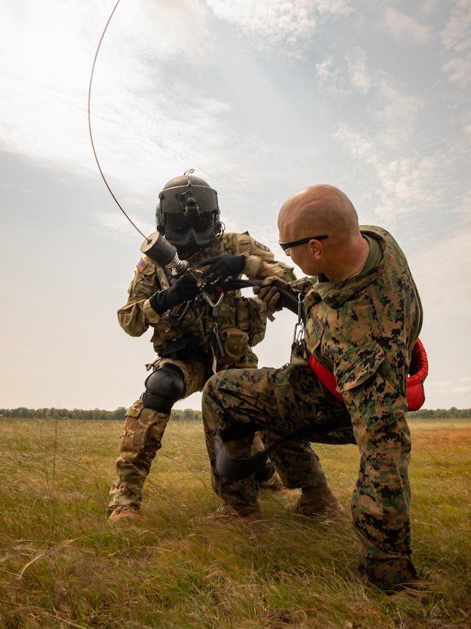 Cpl. Anthony Coccotelli a motor transport mechanic with Combat Logistics Battalion 451, 4th Marine Logistics Group practices casualty evacuation during Northern Strike 21-2 at Camp Grayling, Michigan on Aug 8, 2021. Northern Strike is an annual exercise hosted by the National Guard aboard the National All-Domain Warfighting Center at Camp Grayling, MI. Reserve Marines with Combat Logistics Battalion 451 are providing direct and general support to Joint Task Force 85, increasing interoperability with sister services and integrating with the Active Component. (U.S. Marine Corps photo by Lance Cpl. Colby Bundy)