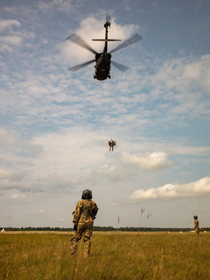 Marines with Combat Logistics Battalion 451, 4th Marine Logistics Group, practice casualty evacuation during Northern Strike 21-2 at Camp Grayling, Michigan on Aug. 8, 2021. Northern Strike is an annual exercise hosted by the National Guard aboard the National All-Domain Warfighting Center at Camp Grayling, MI. Reserve Marines with Combat Logistics Battalion 451 are providing direct and general support to Joint Task Force 85, increasing interoperability with sister services and integrating with the Active Component. (U.S. Marine Corps photo by Lance Cpl. Colby Bundy)