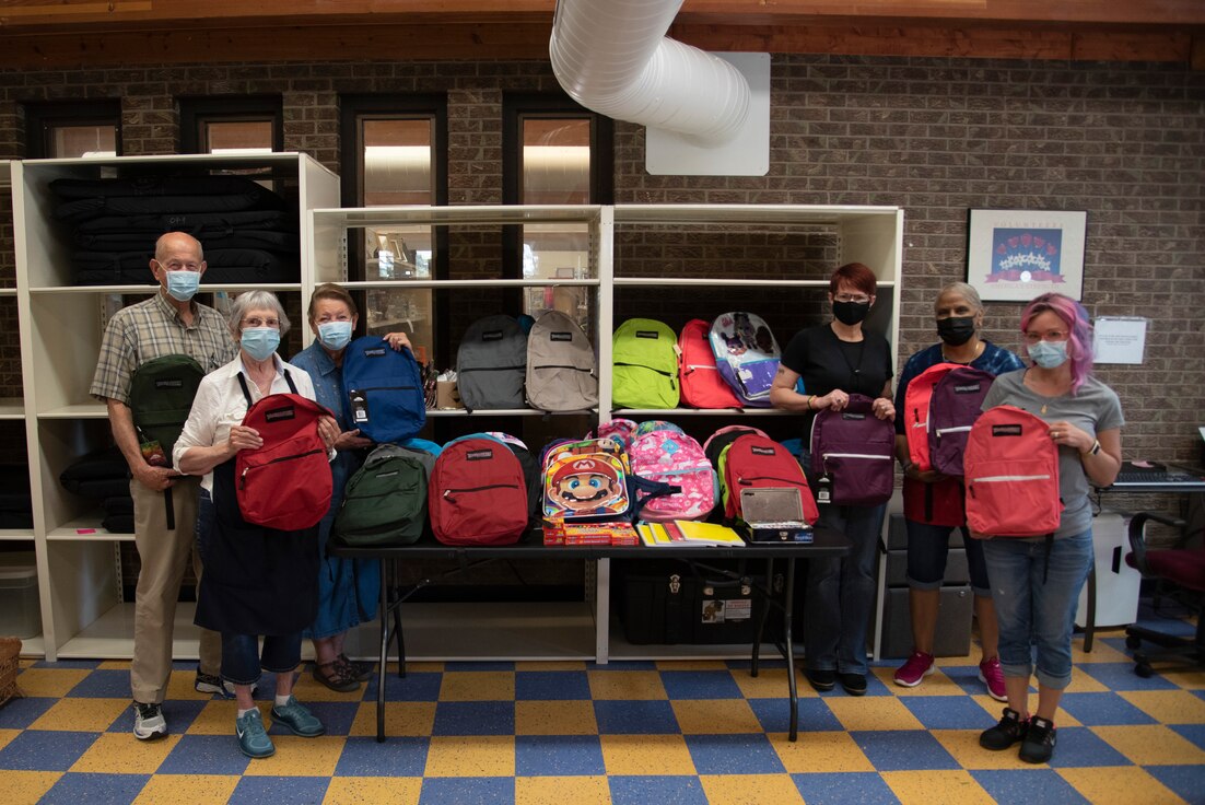 Volunteers from the Peterson Space Force Base Airman’s Attic display school supplies they are donating to Airmen, Guardians and their families at Peterson SFB, Colorado, Aug. 10, 2021. The Peterson Airman’s Attic is located in building 1525 across from the R.P. Lee Youth Center on Selfridge Street. The facility is open 10:00 a.m. to 2:00 p.m. every Tuesday and Wednesday. (U.S. Space Force photo by Airman Aaron Edwards)