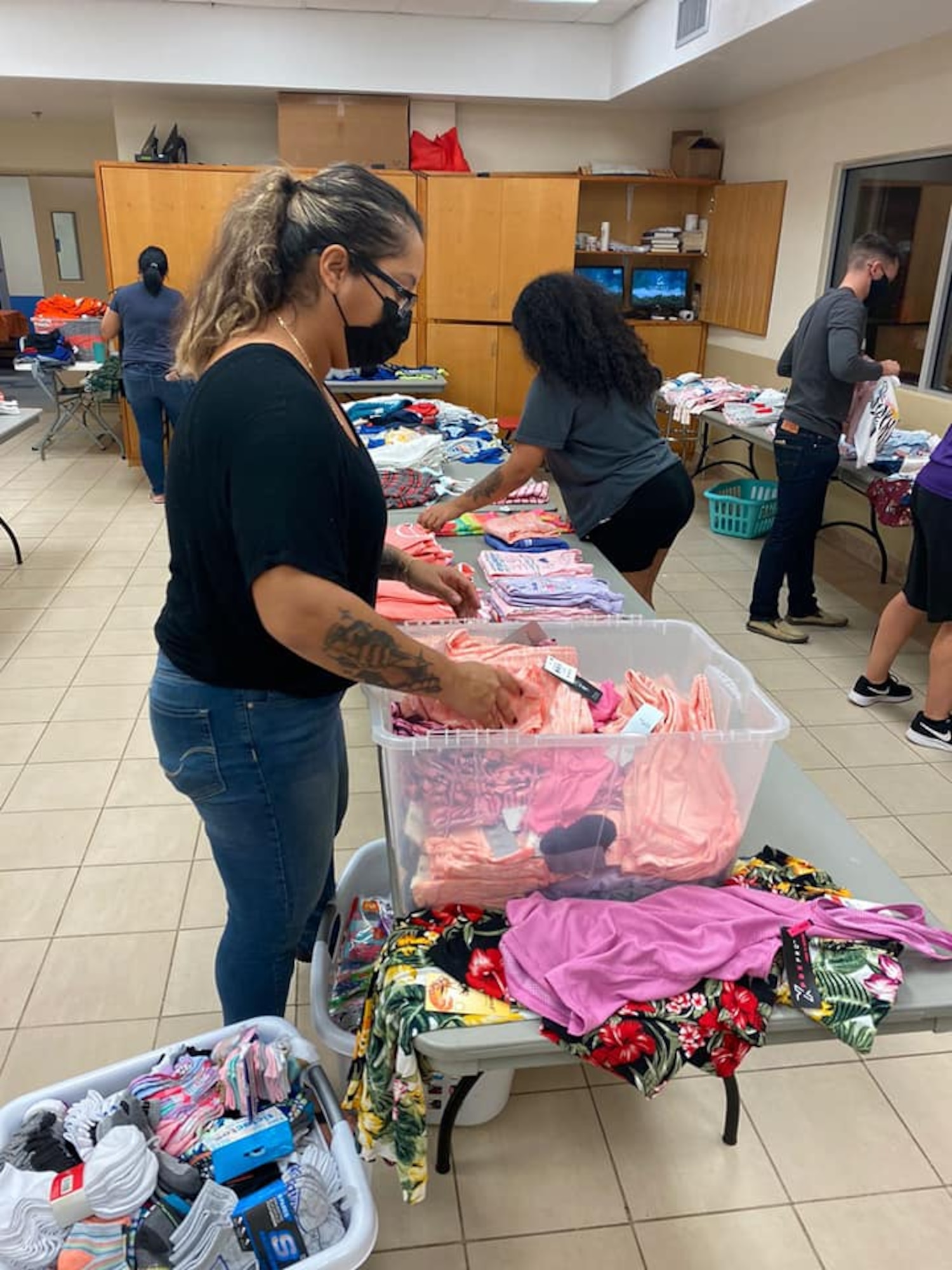 Members from the Air Force Sergeants Association Chapter 1560 volunteer during Back 2 School Supply Stash, hosted by the Harvest House in Barrigada, Guam, August 6, 2021. Fifteen members from AFSA partnered with the Harvest House an organization that aids foster children, and were able to donate $2,000 worth of school supplies during the two-day event. (Courtesy photo)