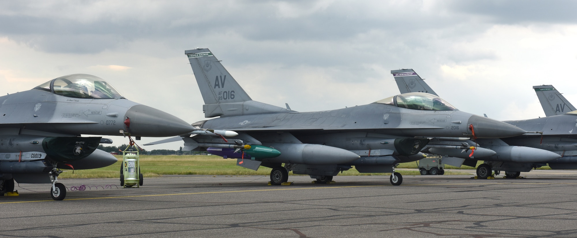 U.S. Air Force F-16 Fighting Falcon aircraft assigned to the 31st Fighter Wing, Aviano Air Base, Italy, sit on the flightline at Royal Air Force Mildenhall, England, Aug. 3, 2021. The F-16 is a compact, multi-role aircraft which is maneuverable and has proven itself in air-to-air combat and air-to-surface attack. (U.S. Air Force photo by Karen Abeyasekere)