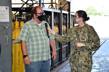 Code 930 Additive Repair Zone Manager Nick Allen shares the recent efforts of the Cold Spray Team with Norfolk Naval Shipyard Commander, Capt. Dianna Wolfson, during the filming of the fifth episode of America’s Shipyard