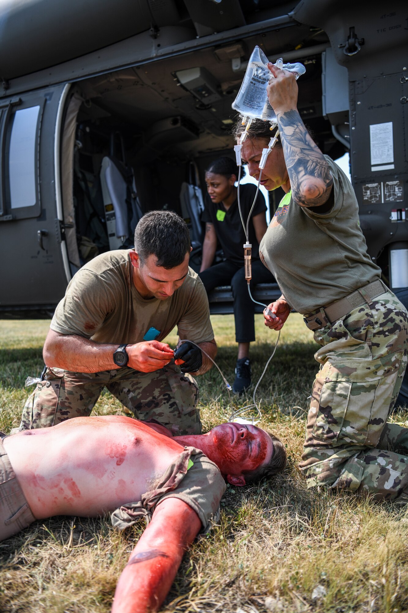 Approximately 120 members of the 445th Aeromedical Staging Squadron, 944th ASTS, Luke AFB, Arizona, and the 244th Aviation Combat Brigade, Fort Knox, Kentucky, undergo Tactical Combat Casualty Care training at Wright State University's Calamityville, Fairborn, Ohio, August 7, 2021. Calamityville is a training, testing, and research venue where military and civilian emergency first responders hone their skills while building relationships. The training was designed to increase skills in caring for combat wounded in challenging remote locations where traditional medical evacuation may not be possible.