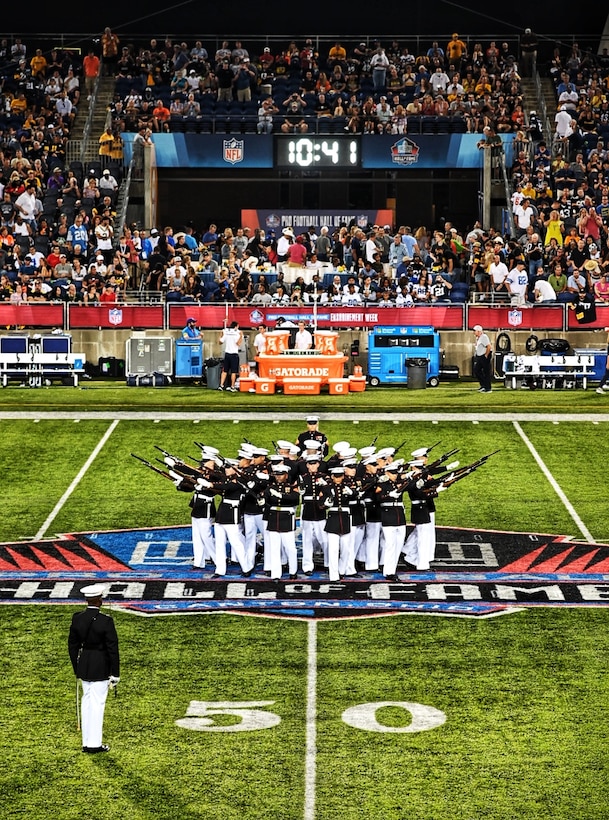A Marine Corps Silent Drill Platoon, from Marine Barracks Washington, D.C., also known as "8th & I," performed during the Pro Football Hall of Fame Game.