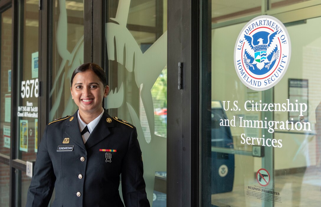 Virginia Army National Guard Soldier Spc. Sri Siri Sundaresan Arumugam, assigned to Maneuver Training Center Fort Pickett, becomes a U.S. citizen July 29, 2021, at the U.S. Citizenship and Immigration Services Field Office in Norfolk, Va. Sundaresan Arumugam, a native of India, joined the Army National Guard in April 2019 and was assigned to Fort Pickett in October 2020 after completing Army Basic Combat Training and Advanced Individual Training. (U.S. Army National Guard photo by Staff Sgt. Lisa M. Sadler)