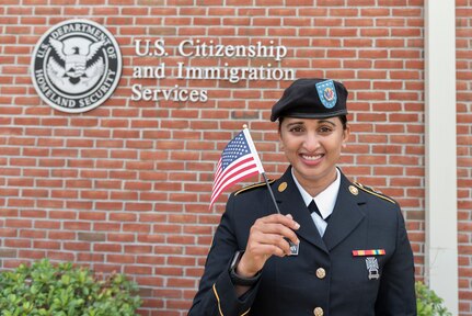 Virginia Army National Guard Soldier Spc. Sri Siri Sundaresan Arumugam, assigned to Maneuver Training Center Fort Pickett, becomes a U.S. citizen July 29, 2021, at the U.S. Citizenship and Immigration Services Field Office in Norfolk, Va. Sundaresan Arumugam, a native of India, joined the Army National Guard in April 2019 and was assigned to Fort Pickett in October 2020 after completing Army Basic Combat Training and Advanced Individual Training. (U.S. Army National Guard photo by Staff Sgt. Lisa M. Sadler)