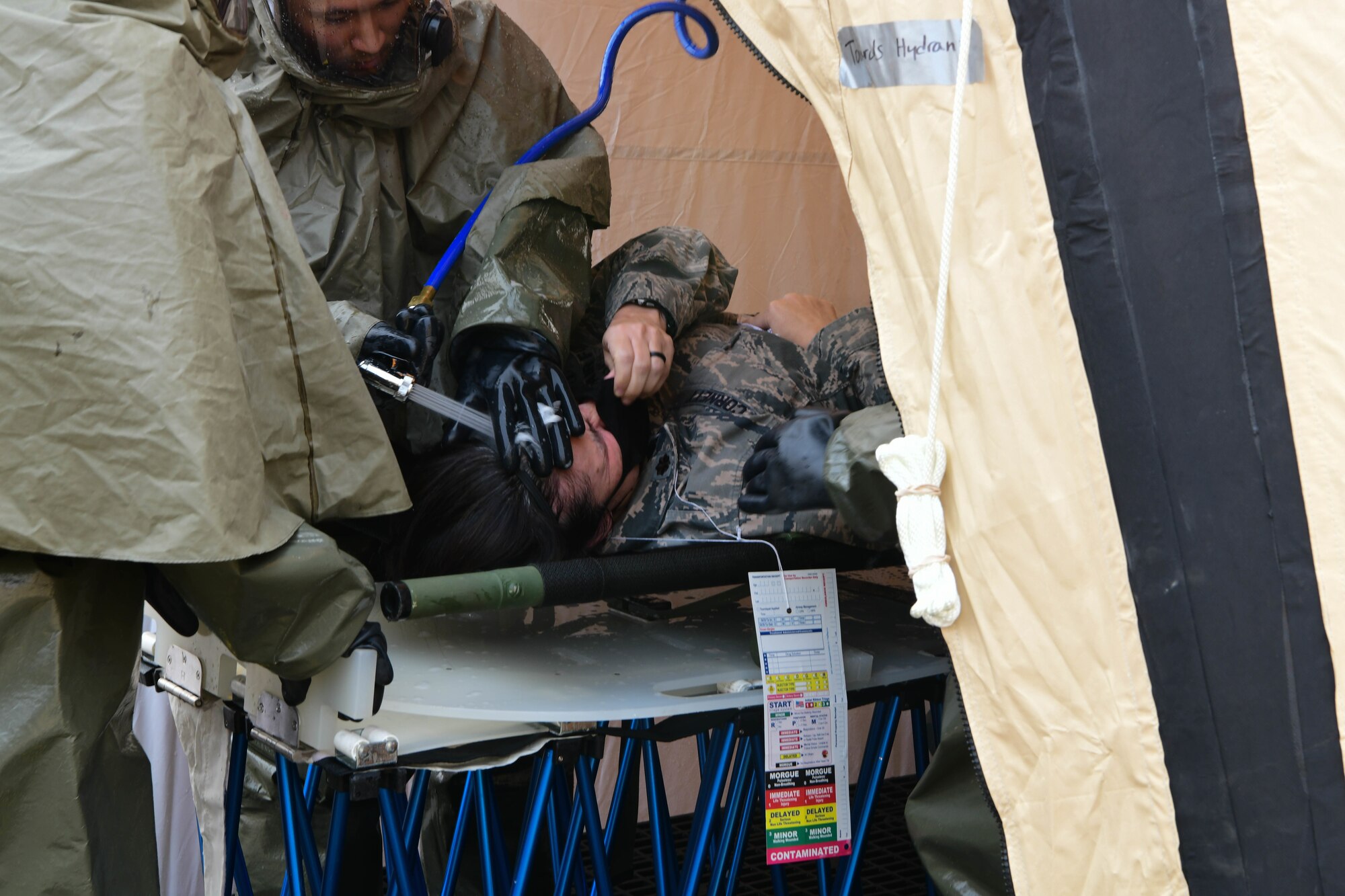 9th Medical Group (MDG) Airmen practice decontamination procedures during exercise Ready Eagle Aug. 6, 2021, at Beale Air Force Base, California.