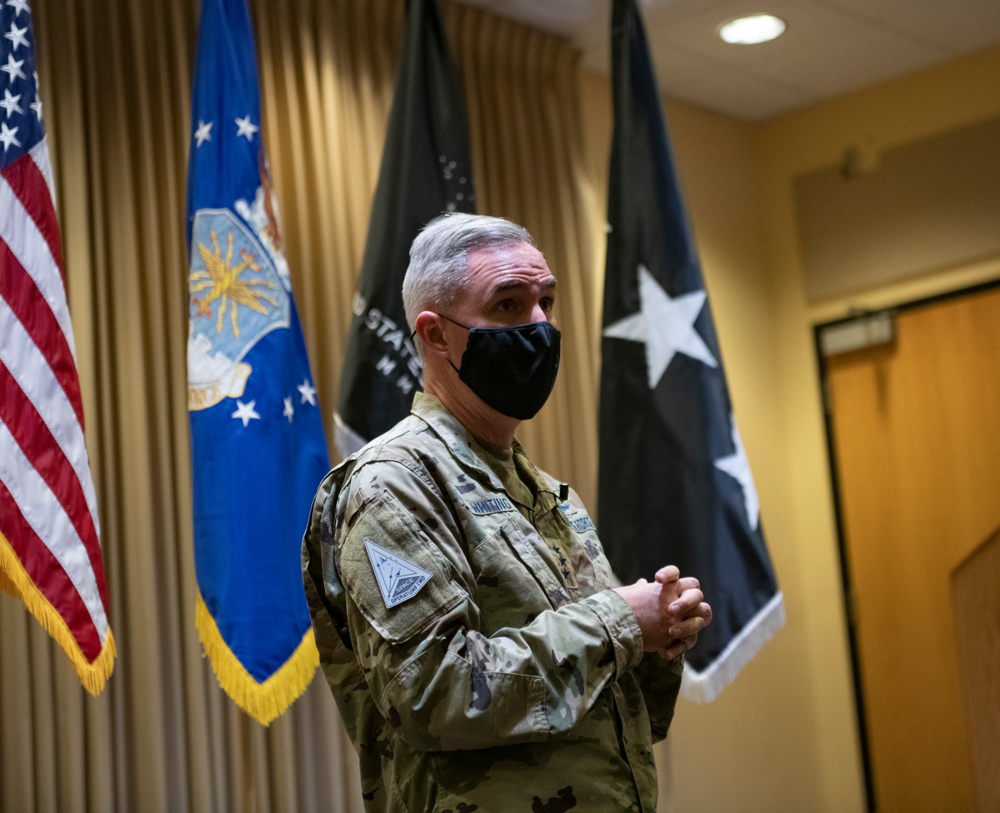 Man with mask talking