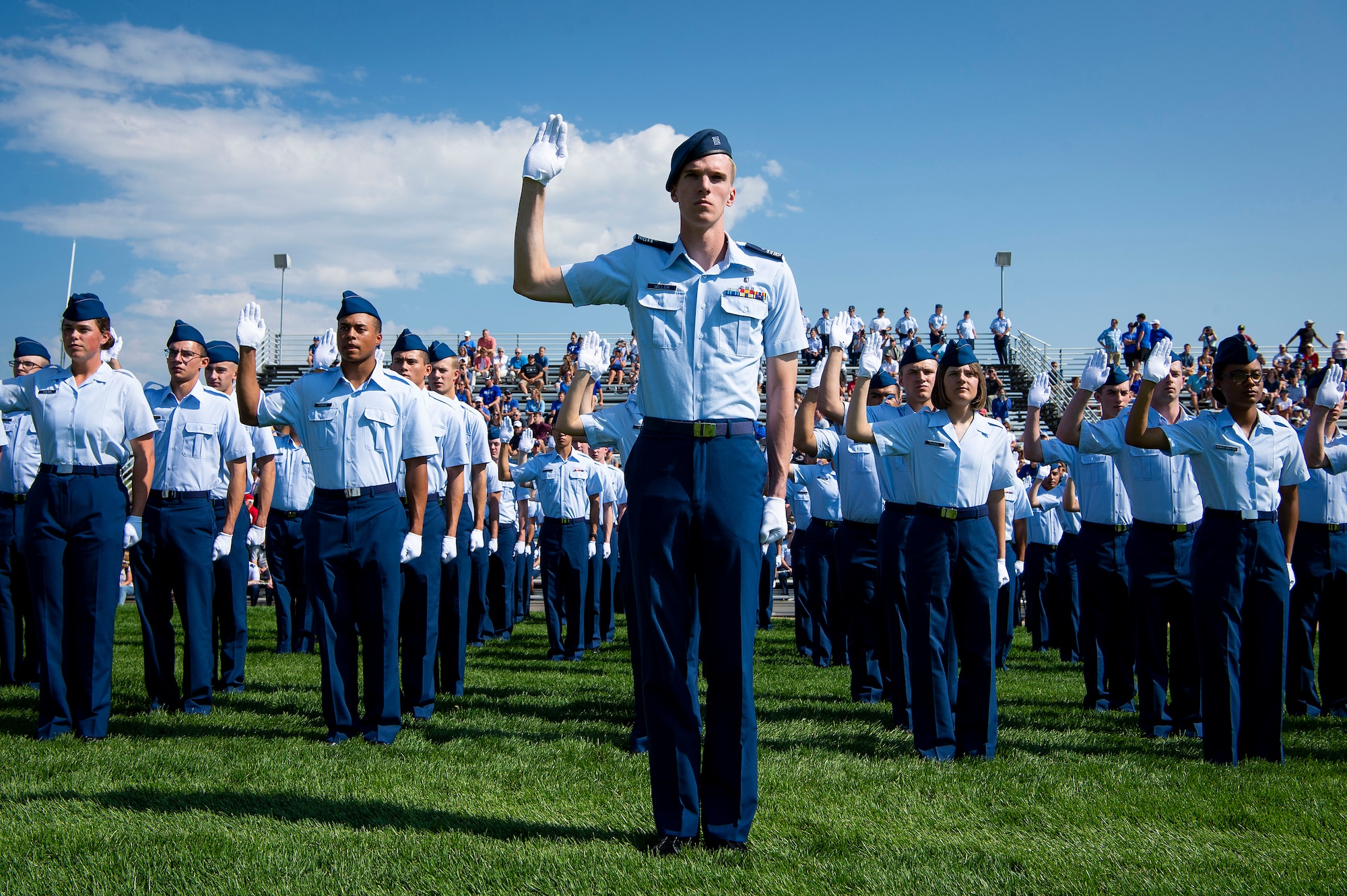 C1C Benjamin Miller, Demons Echo Flight commander, leads a group of fourth class cadets to cite the honor oath during the U.S. Air Force Academy’s Acceptance Day ceremony at Stillman Parade Field