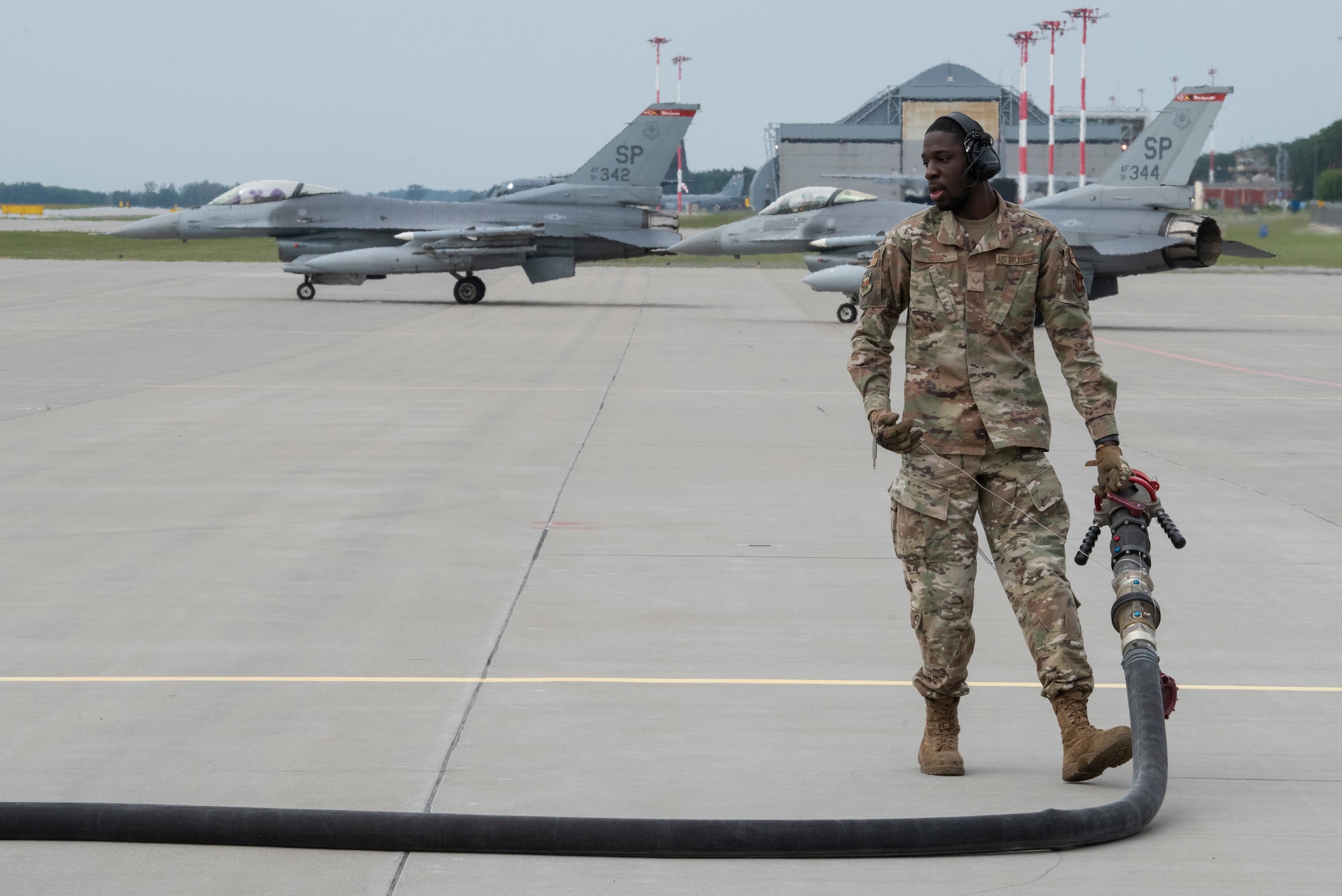 U.S. Air Force Senior Airman Maurice Pugh, 480th Expeditionary Fighter Squadron Fuels Management Flight fuels operator, prepares to defuel the Versatile Integrating Partner Equipment Refueling Kit (VIPER) kit, to prepare it for shipping at Powidz Air Base, Poland, Aug. 10, 2021. Employing the rapid refuel kit reduces the requirement to transport hazardous cargo, which saves fuel, equipment, and taxpayer dollars, while decreasing the Air Force’s environmental footprint. (U.S. Air Force photo by Tech. Sgt. Anthony Plyler)