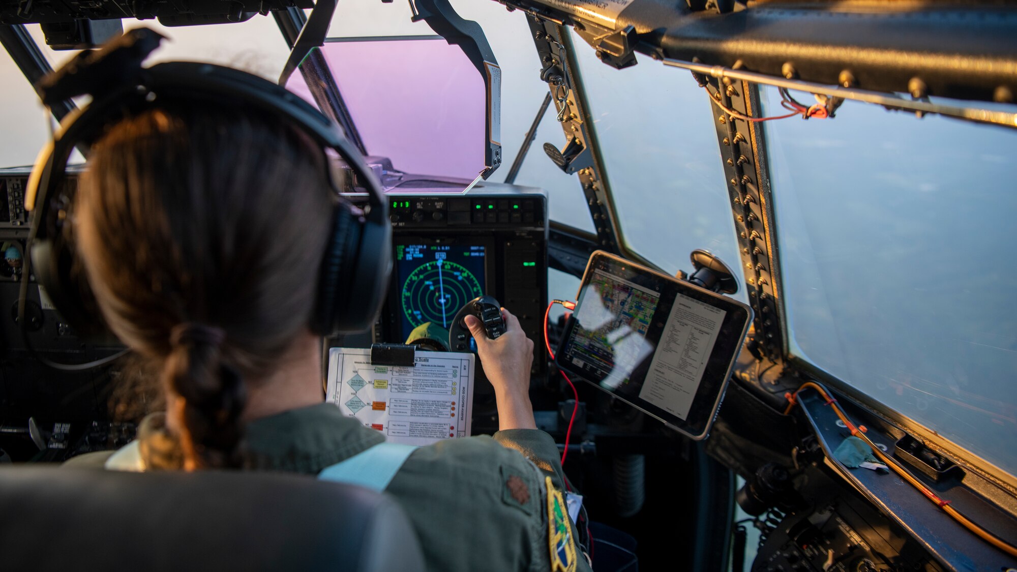 U.S. Air Force Maj. Catherine Olszewski, a 417th Flight Test Squadron pilot, flies an EC-130J Commando Solo during Operation Blood Rain near Eglin Range, Florida, Aug. 5, 2021.