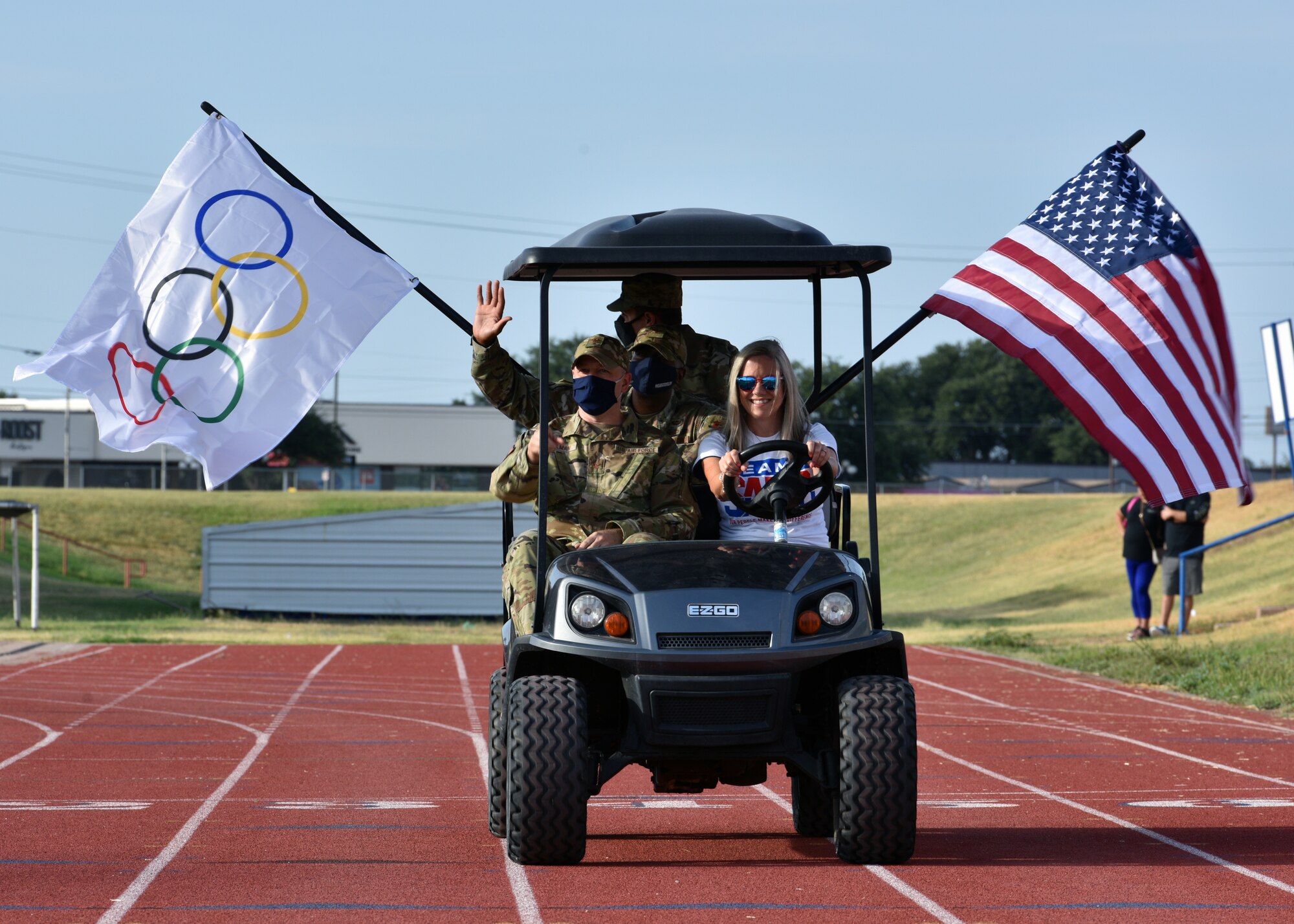 U.S. Air Force Col. Matthew Reilman, 17th Training Wing commander, and Col. James Finlayson, 17th TRW vice commander, enter the San Angelo Independent School District Convocation at the San Angelo Stadium in San Angelo, Texas, August 11, 2021. Reilman and Finlayson represented Goodfellow Air Force Base at the event along with other military leaders. (U.S. Air Force photo by Senior Airman Ashley Thrash)