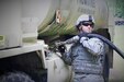 pc. Chase Byrum, petroleum supply specialist (92F), with Distribution Company, 149th Brigade Support Battalion fuels an M978A4 HEMTT Tanker at Harold L. Disney training area, June 5, 2016 in preparation for a Logistics Package (LOGPAC) convoy.