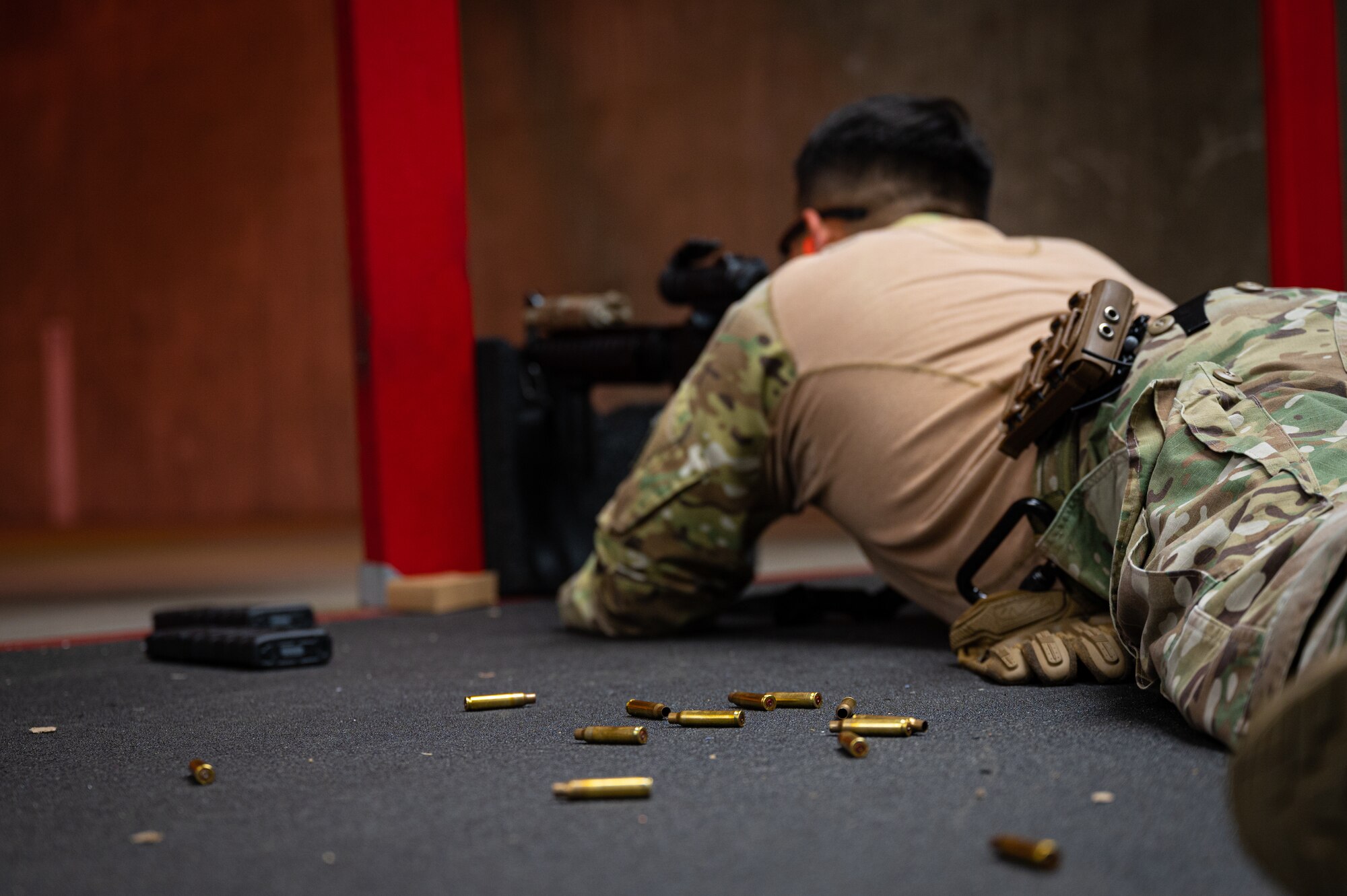 U.S. Air Force Staff Sgt. Christian Watters, 56th Security Forces Squadron patrolman, fires an M4A1 rifle during a weapons qualification course at the Combat Arms Training and Maintenance facility Aug. 3, 2021, at Luke Air Force Base, Arizona.