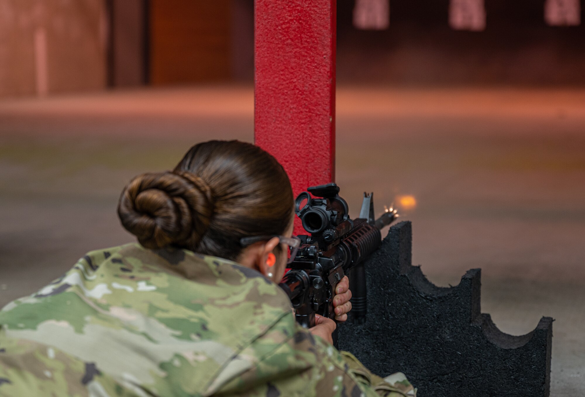 U.S. Air Force Senior Airman Daisy Valencia, 56th Security Forces Squadron defender, fires an M4A1 rifle during a weapons qualification course at the Combat Arms Training and Maintenance facility Aug. 3, 2021, at Luke Air Force Base, Arizona.