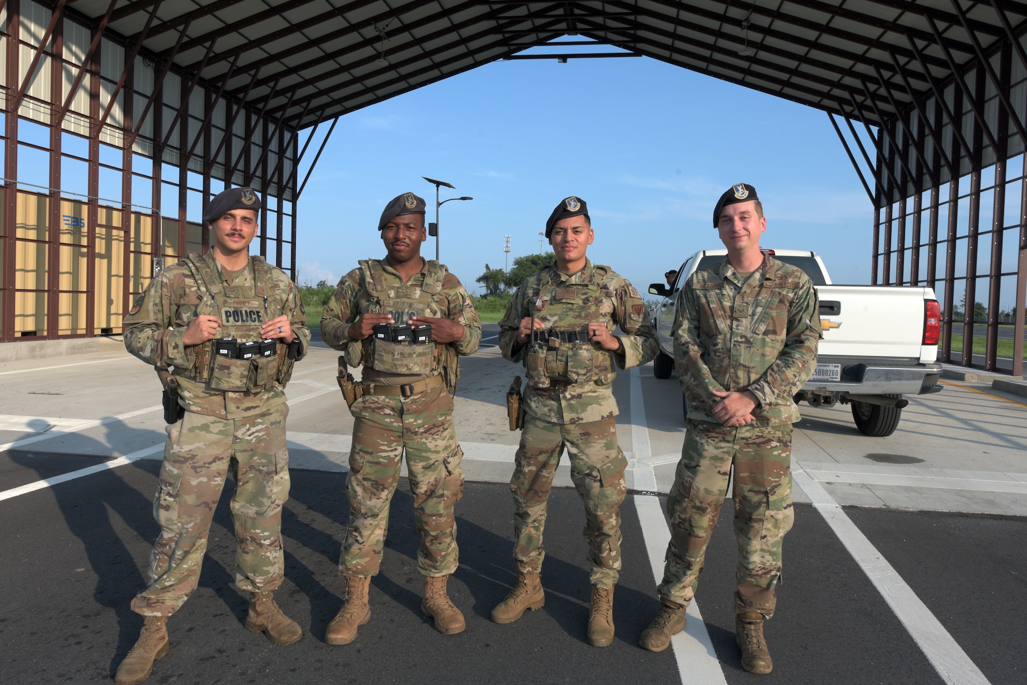 Vehicle search specialists, pose for a photo