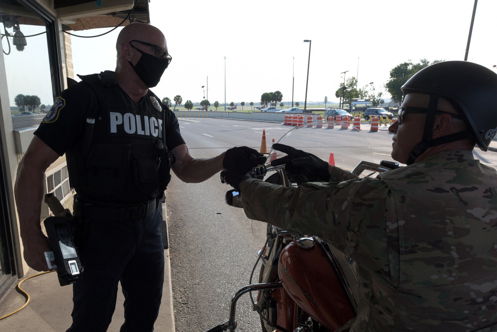 Patrolman verifies a common access card