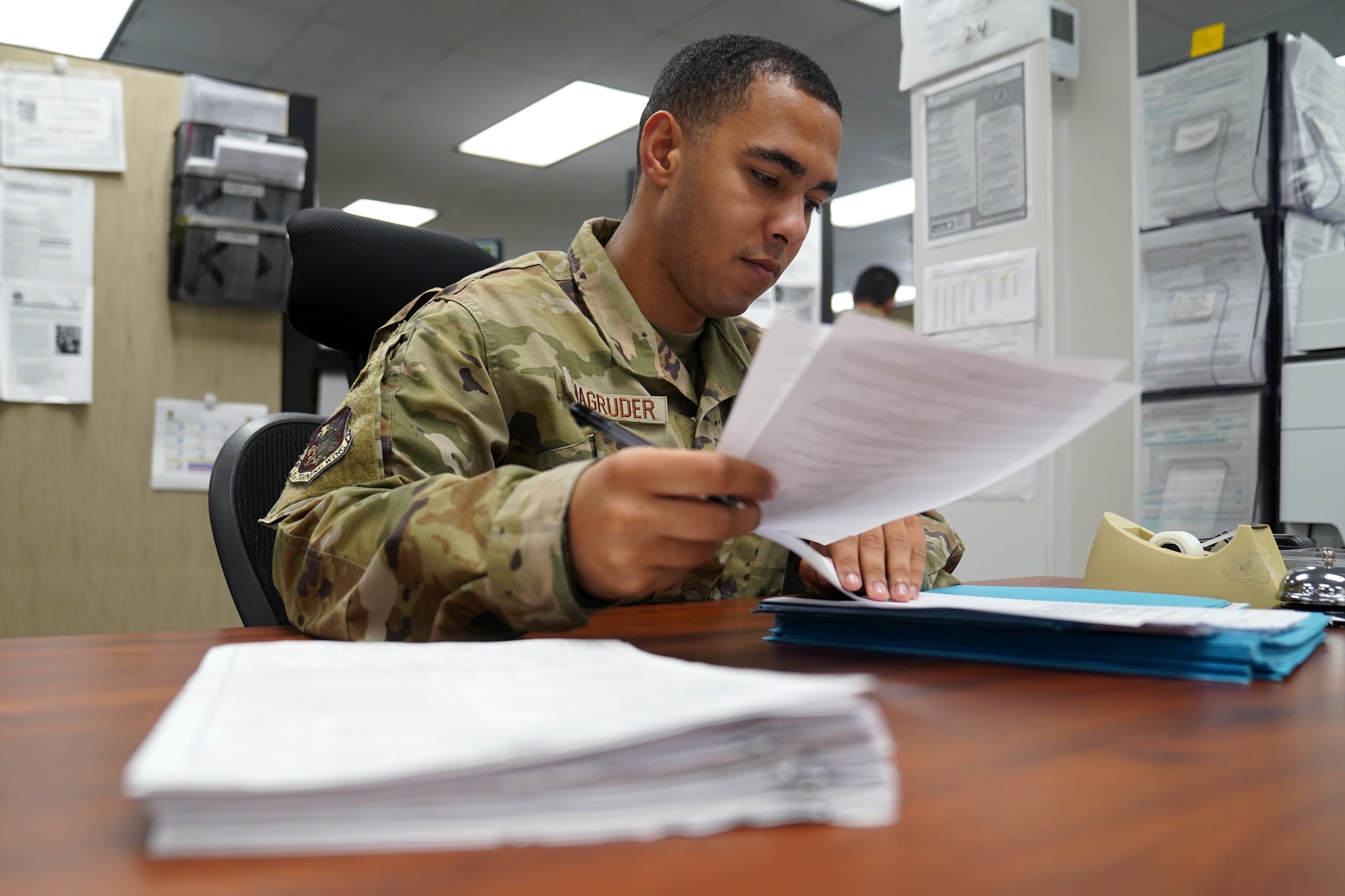 U.S. Air Force Airman 1st Class Noah Magruder, 81st Comptroller Squadron special actions technician, computes travel entitlements inside the Sablich Center at Keesler Air Force Base, Mississippi, July 28, 2021. From managing the finances of Keesler personnel to being a part of the Keesler Airman's Council and creating the Junior Enlisted Professional Enhancement Seminar, Magruder embraces his role as an Airman and acknowledges his impact on the mission. (U.S. Air Force photo by Senior Airman Seth Haddix)