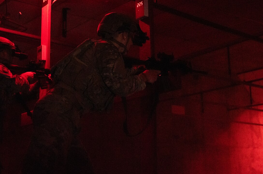 U.S. Air Force Senior Airman Noah Huff, 56th Security Forces Squadron military working dog handler, fires an M41A rifle while using night-vision goggles during a weapons qualification course Aug. 3, 2021, at Luke Air Force Base, Arizona.