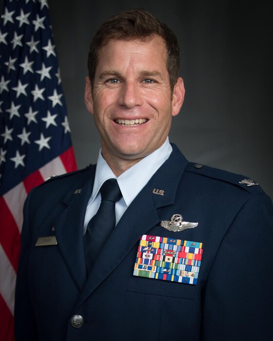 Colonel Brett Comer is the Commander, 944th Operations Group, United States Air Force Reserve, Luke Air Force Base, Arizona.
