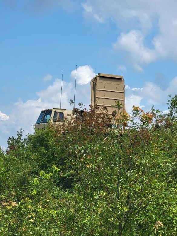Soldiers with the 197th Field Artillery Brigade, New Hampshire Army National Guard, set up their AN/TPQ-53 Firefinder Radar during Northern Strike 21, Camp Grayling Joint Maneuver Training Center, Grayling, Michigan, Aug. 8, 2021.