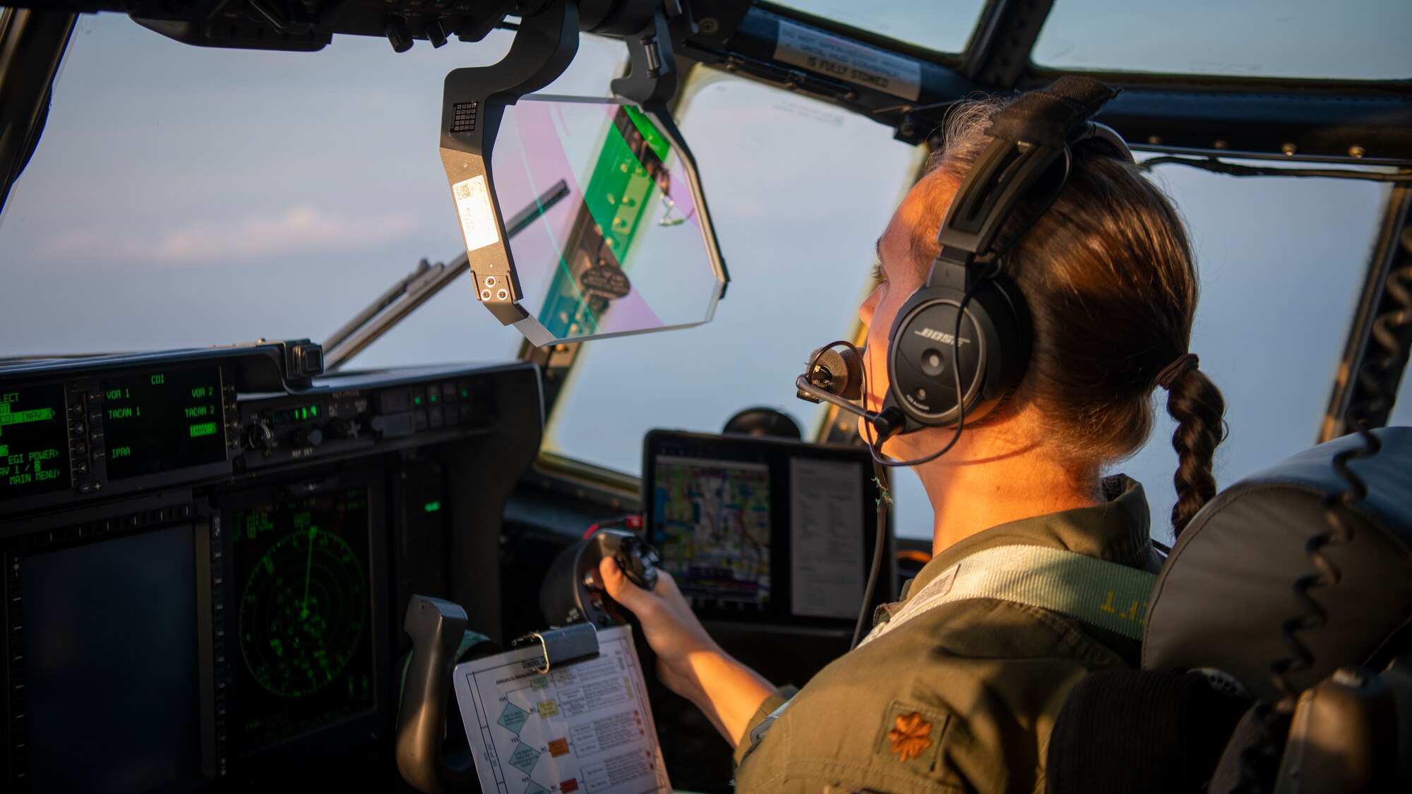 U.S. Air Force Maj. Catherine Olszewski, a 417th Flight Test Squadron pilot, flies a modified EC-130J Commando Solo during Operation Blood Rain near Eglin Range, Florida, Aug. 5, 2021.