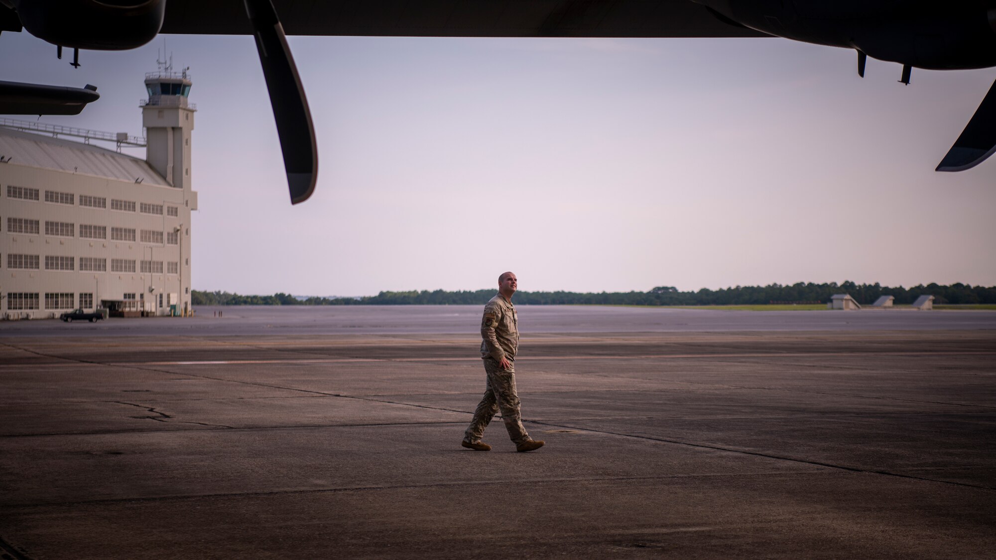 U.S. Air Force Maj. Raymond Gerard, a 492nd Special Operations Training Group Detachment 2 instructor pilot, performs pre-flight inspections on a modified EC-130J Commando Solo at Eglin Air Force Base, Florida, Aug. 5, 2021.