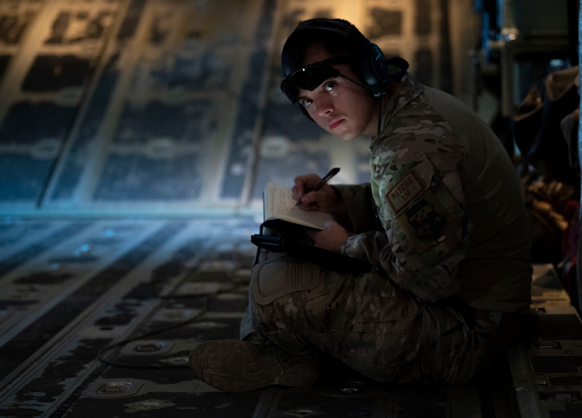 A U.S. Airman from the 26th Expeditionary Rescue Squadron performs routine operations during an exercise July 28, 2021, at an undisclosed location somewhere in Southwest Asia. The 26th ERQS stands alert for the U.S. Central Command area of responsibility, providing tanker capability for the associated HH-60G Pave Hawk helicopters and can also provide a forward refueling point in austere locations. (U.S. Air Force photo by Senior Airman Karla Parra)
